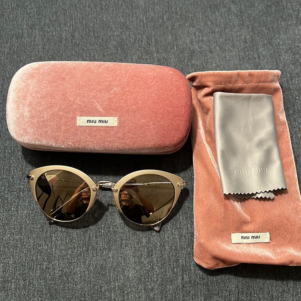 Miumiu vintage gold sunglasses. Comes with case, dust bag and cleaning cloth